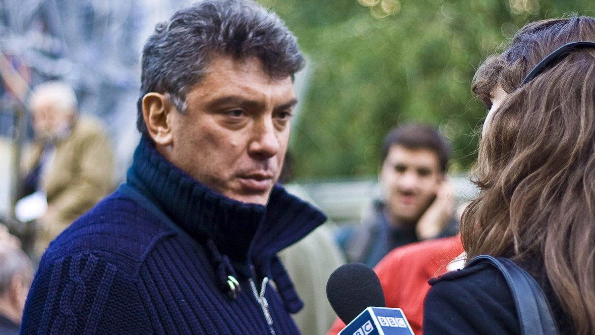 The archive photo taken on Oct. 7, 2009 shows Russian opposition leader Boris Nemtsov (L) attending a rally in memory of killed Russian journalist Anna Politkovskaya in Moscow, Russia. Russian opposit ...