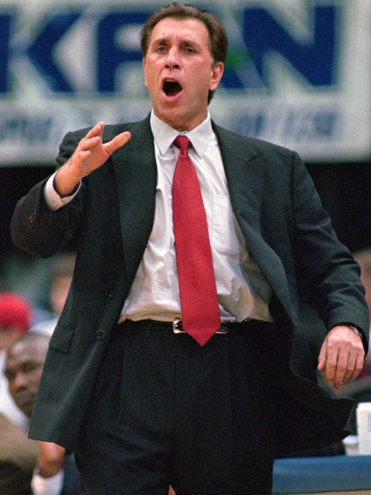 Houston Rockets head coach Rudy Tomjanovich calls out to his players in the first quarter against the Minnesota Timberwolves in Minneapolis, in this Feb. 17, 1999 photo. Tomjanovich has agreed to cont ...