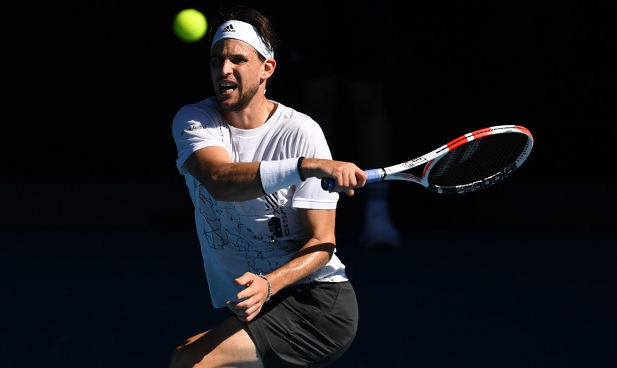 epa09011252 Dominic Thiem of Austria in action during his fourth Round Men&#039;s singles match against Grigor Dimitrov of Bulgaria at the Australian Open grand slam tennis tournament at Melbourne Par ...