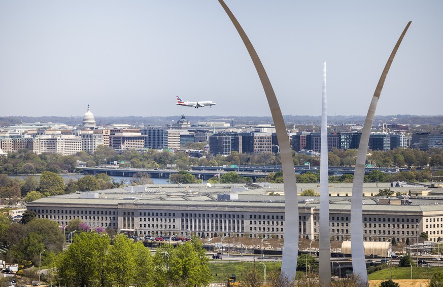 epa10567797 The Pentagon behind the United States Air Force Memorial in Arlington, Virginia, USA, 10 April 2023. Classified military documents that were leaked online ?pose a very serious risk to nati ...