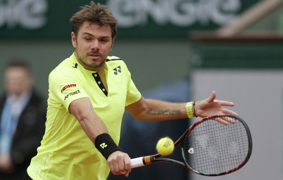 Tennis - French Open - Roland Garros - Switzerland's Stan Wawrinka vs Czech Republic's Lukas Rosol - Paris, France - 23/05/16. Switzerland's Stan Wawrinka returns the ball. REUTERS/Gonzalo Fuentes