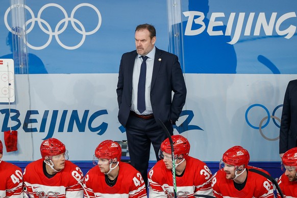 epa09750340 Denmark head coach Heinz Ehlers during the Men&#039;s Ice Hockey preliminary round match between Switzerland and Denmark at the Beijing 2022 Olympic Games, Beijing, China, 12 February 2022 ...