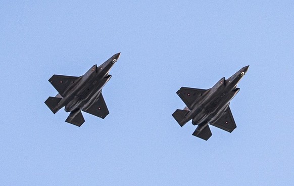 epa12073005 Two Danish F-35 fighter jets fly over as the Danish government marks the 80th anniversary of Denmark&#039;s liberation, at Kastellet in Copenhagen, Denmark, 04 May 2025. EPA/EMIL NICOLAI H ...