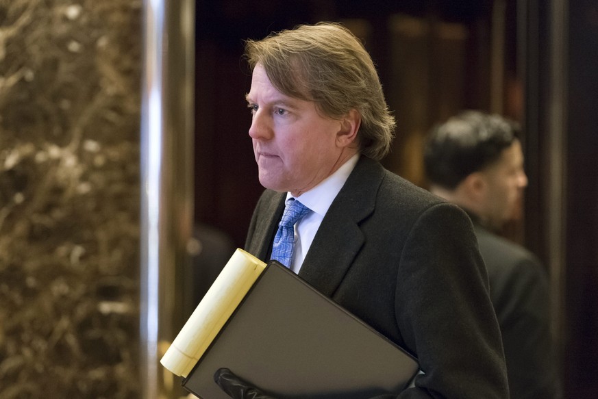 epa05708183 Attorney and United States Federal Election Commission member Don McGahn is seen in the lobby of Trump Tower in New York, New York, USA, 09 January 2017. US President-elect Donald Trump wi ...