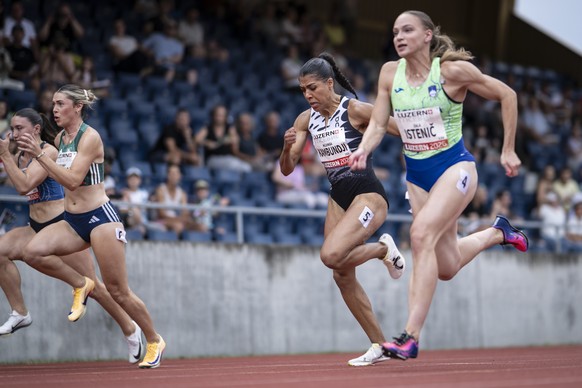 Mujinga Kambundji from Switzerland, center, in action the 100 meter competition at the International Athletics Meeting in Lucerne, Switzerland, on Thursday, July 16, 2026. (KEYSTONE/Gian Ehrenzeller)