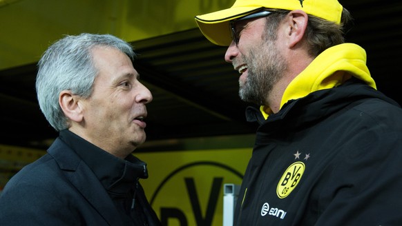 epa04482866 Dortmund&#039;s coach Juergen Klopp (R) and Moenchengladbach&#039;s coach Lucien Favre (L) greet each other before the German Bundesliga soccer match between Borussia Dortmund and Borussia ...