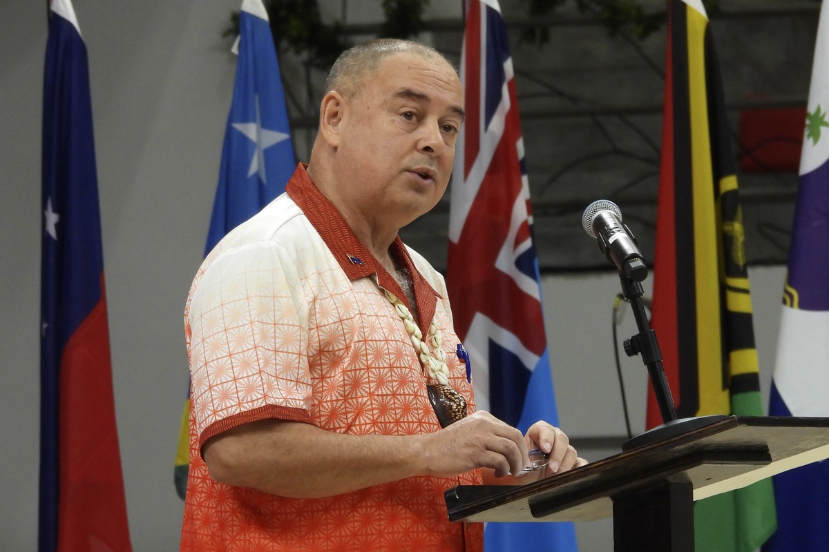 Cook Islands Prime Minister, and outgoing Chair of the Pacific Islands Forum, Mark Brown speaks at the opening of the annual Pacific Islands Forum leaders meeting in Nuku'alofa, Tonga, Monday, Au ...