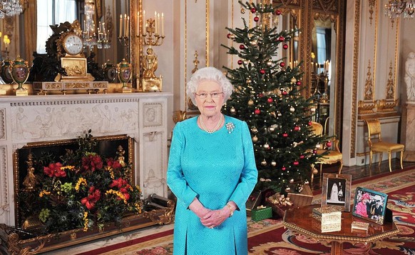 LONDON - DECEMBER 10: Queen Elizabeth II is pictured prior to the recording of her Christmas Day broadcast to the Commonwealth, in the White Drawing Room at Buckingham Palace on December 10, 2009 in L ...