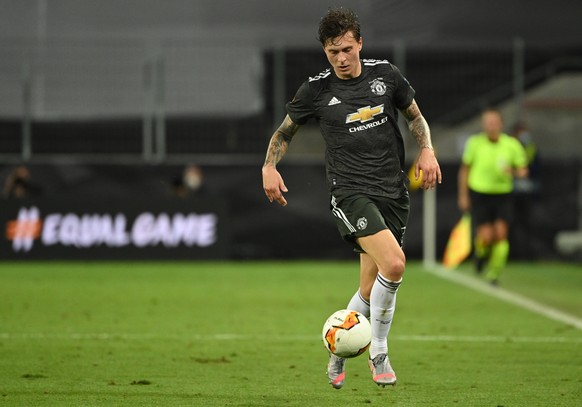 epa08608257 Victor Lindeloef of Manchester United during the UEFA Europa League semi final match between Sevilla FC and Manchester United in Cologne, Germany, 16 August 2020. EPA/Ina Fassbender / POOL