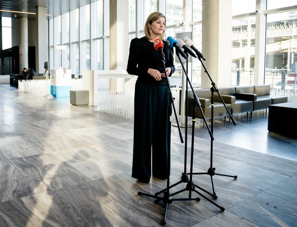 epa10454503 Dutch Minister for Foreign Trade and Development Cooperation Liesje Schreinemacher speaks during a press conference in The Hague, The Netherlands, 08 February 2023. The minister is making  ...