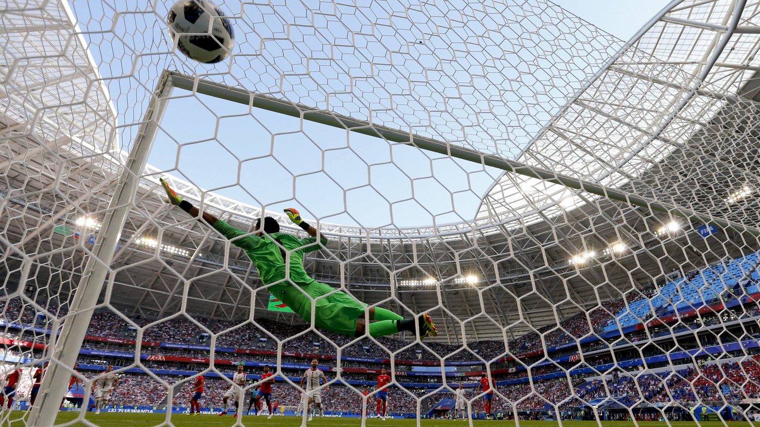 Costa Rica goalkeeper Keylor Navas fails to stop Serbia&#039;s Aleksandar Kolarov scoring the opening goal during the group E match between Costa Rica and Serbia at the 2018 soccer World Cup in the Sa ...