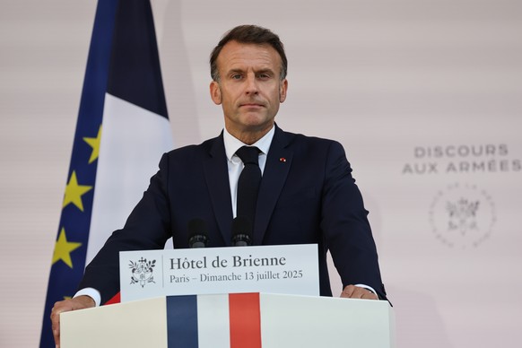 epa12236110 French President Emmanuel Macron delivers a speech to army leaders on the eve of the annual Bastille Day Parade, at the l?Hotel de Brienne in Paris, France, 13 July 2025. EPA/LUDOVIC MARIN ...