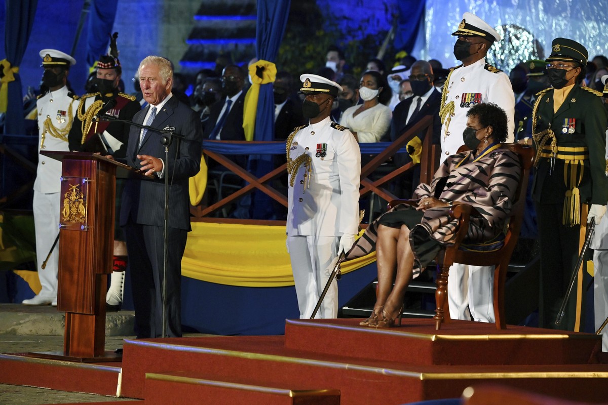 Britain's Prince Charles, speaks as President of Barbados, Dame Sandra Mason, right, listens, during the Presidential Inauguration Ceremony, at Heroes Square, in Bridgetown, Barbados, Tuesday, No ...