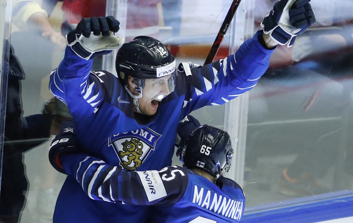 Finland's Marko Anttila, left, celebrates with teammate Sakari Manninen, right, after scoring a goal during the Ice Hockey World Championships group B match between Finland and the United States  ...