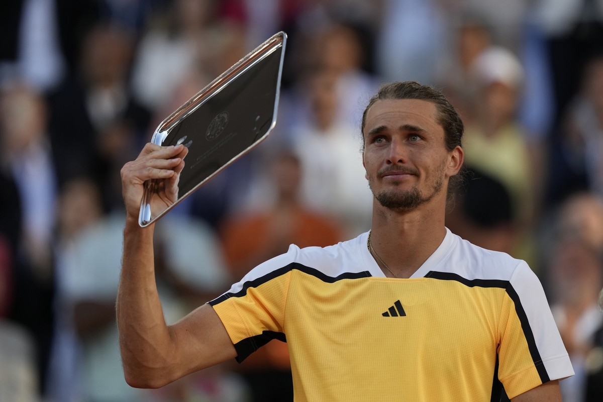 Second placed Germany's Alexander Zverev holds his trophy after the men's final match of the French Open tennis tournament against Spain's Carlos Alcaraz at the Roland Garros stadium in ...