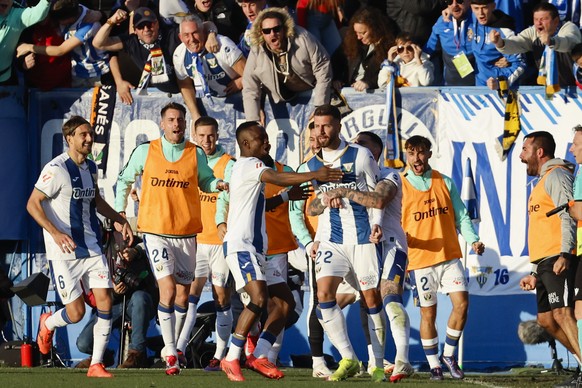 epa11834199 Leganes defender Matija Nastasic (4R) celebrates with his teammates after scoring the 1-0 during the EA Sports LaLiga match between CD Leganes and Atletico Madrid, at the Municipal Butarqu ...