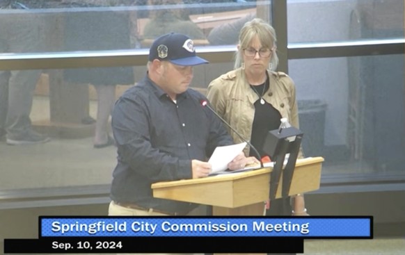 This image made from video released by the City of Springfield shows Nathan Clark, father of Aiden Clark, speaking at a City Commission meeting, Tuesday, Sept. 10, 2024 in Springfield, Ohio. (City of  ...