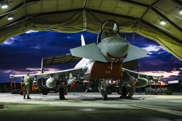 .In this image provided by the UK Ministry of Defence, RAF Weapon Technicians prepare RAF Typhoon FRG4s aircraft to conduct further strikes against Houthi military targets in Yemen, from RAF Akrotiri, ...