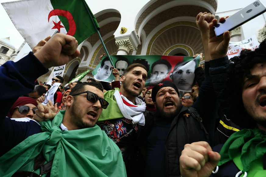 Algerians gather for a demonstration in Algiers, Friday, March 8, 2019. A festive crowd of thousands of protesters marched through central Algiers to protest President Abdelaziz Bouteflika&#039;s hold ...