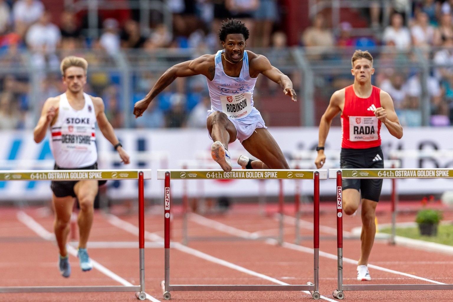 L-R Seamus Derbyshire of Britain, Chris Robinson of USA and Michal Rada of Czech compete in 400m hurdles - men at the Golden Spike Ostrava 2025 - World Athletics Continental Tour Gold, in Ostrava, Cze ...