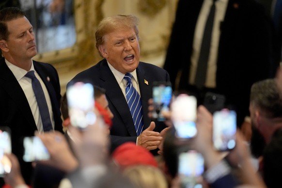 Republican presidential candidate former President Donald Trump greets supporters after he speaks at a Super Tuesday election night party, Tuesday, March 5, 2024, at Mar-a-Lago in Palm Beach, Fla. (AP ...