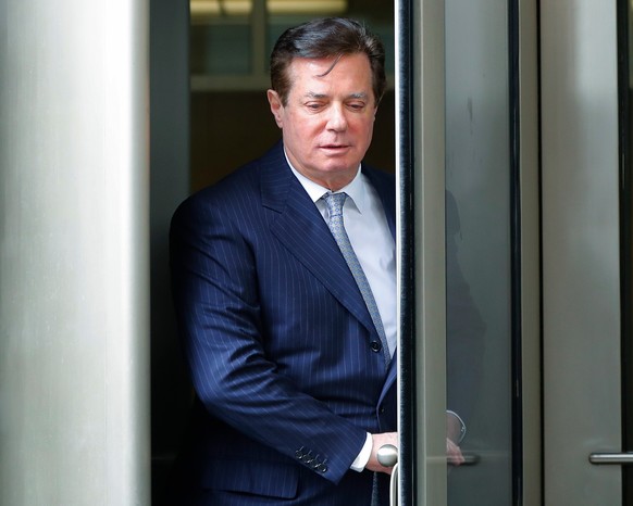 FILE - In this Feb. 14, 2018, file photo, Paul Manafort leaves the federal courthouse in Washington. The trial of President Donald Trump’s former campaign chairman will open this week with tales of la ...