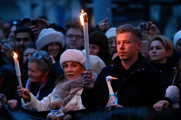 Chairman of the Hungarian opposition Tisza Party Peter Magyar, right, Vice Chairman of Tisza Party Agnes Forsthoffer, sixth from left, and opera singer Andrea Rost, the party&#039;s parliamentary cand ...