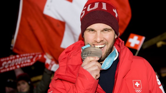 Silver medalist Marc Bischofberger of Switzerland celebrates at the House of Switzerland after the Men Freestyle Skiing Ski Cross final during the XXIII Winter Olympics 2018 in Pyeongchang, South Kore ...