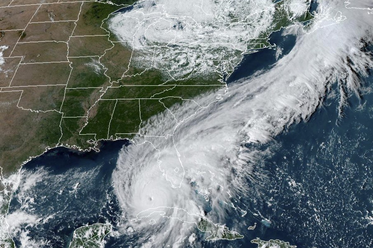 This GOES-East GeoCcolor satellite image taken at 4:26 p.m. EDT on Tuesday, Sept. 27, 2022, and provided by the National Oceanic and Atmospheric Administration (NOAA), shows Hurricane Ian over the Gul ...