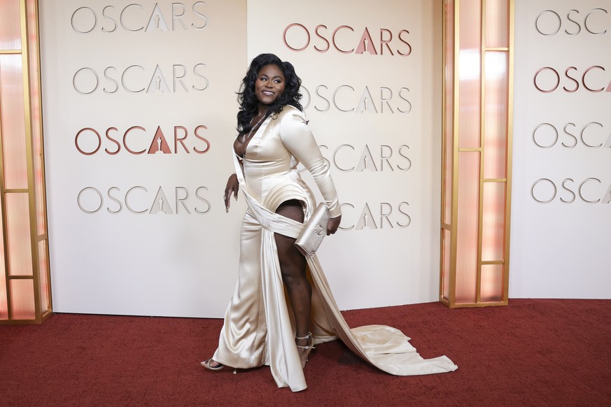epa12823200 American actor Danielle Brooks poses for photographs on the red carpet prior to the 98th annual Academy Awards ceremony at the Dolby Theatre in Los Angeles, California, USA, 15 March 2026. ...