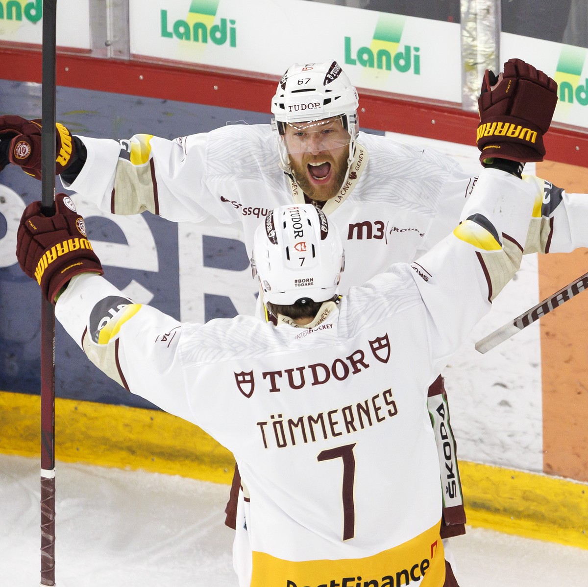 Geneve-Servette's forward Linus Omark #67 celebrates his goal with his teammate Geneve-Servette's defender Henrik Toemmernes #7 after scoring the 0:1, during the sixth leg of the National Le ...
