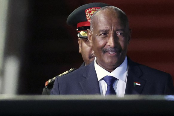 Sudan&#039;s army chief Abdel Fattah al-Burhan arrives at Beijing Capital International Airport in Beijing, China, Tuesday, Sept. 3, 2024. (Florence Lo/Pool Photo via AP)