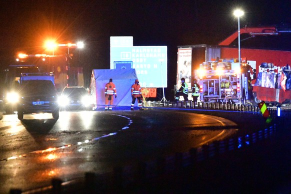 People work on the scene after an accident on Sunday, Oct. 3, 2021 outside the town Markaryd in Sweden. Three people died in the accident one of them is the Swedish artist Lars Vilks and the other two ...