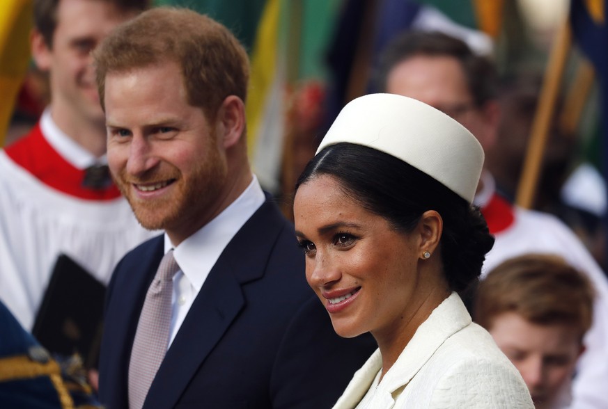 FILE - In this Monday, March 11, 2019 file photo, Britain&#039;s Prince Harry and Meghan, the Duchess of Sussex leave after the Commonwealth Service at Westminster Abbey in London. Prince Harry and Me ...