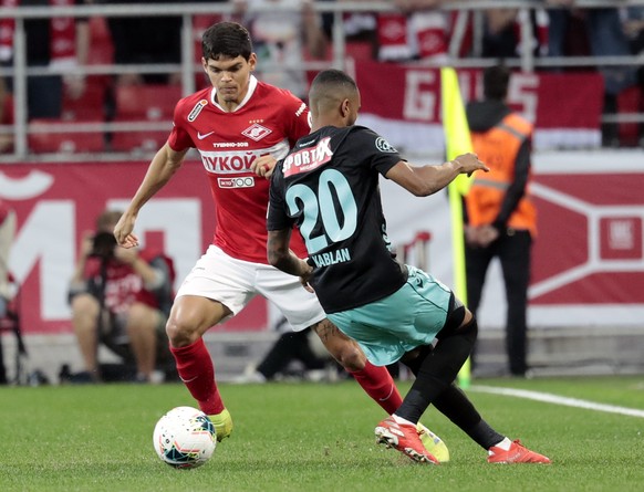 epa07775000 Ayrton Lucas Dantas De Medeiros (L) of Spartak Moscow in action against Chris Kablan of FC Thun during UEFA Europa League third qualifying round, second leg, soccer match between Spartak M ...