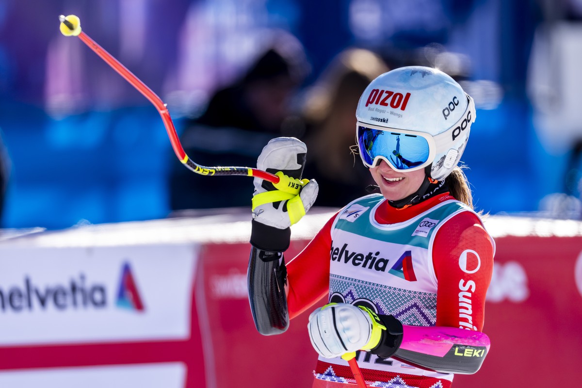 Janine Schmitt of Switzerland reacts in the finish area during the women's Super-G race at the Alpine Skiing FIS Ski World Cup, in St. Moritz, Switzerland, Sunday, December 14, 2025. (KEYSTONE/Cl ...