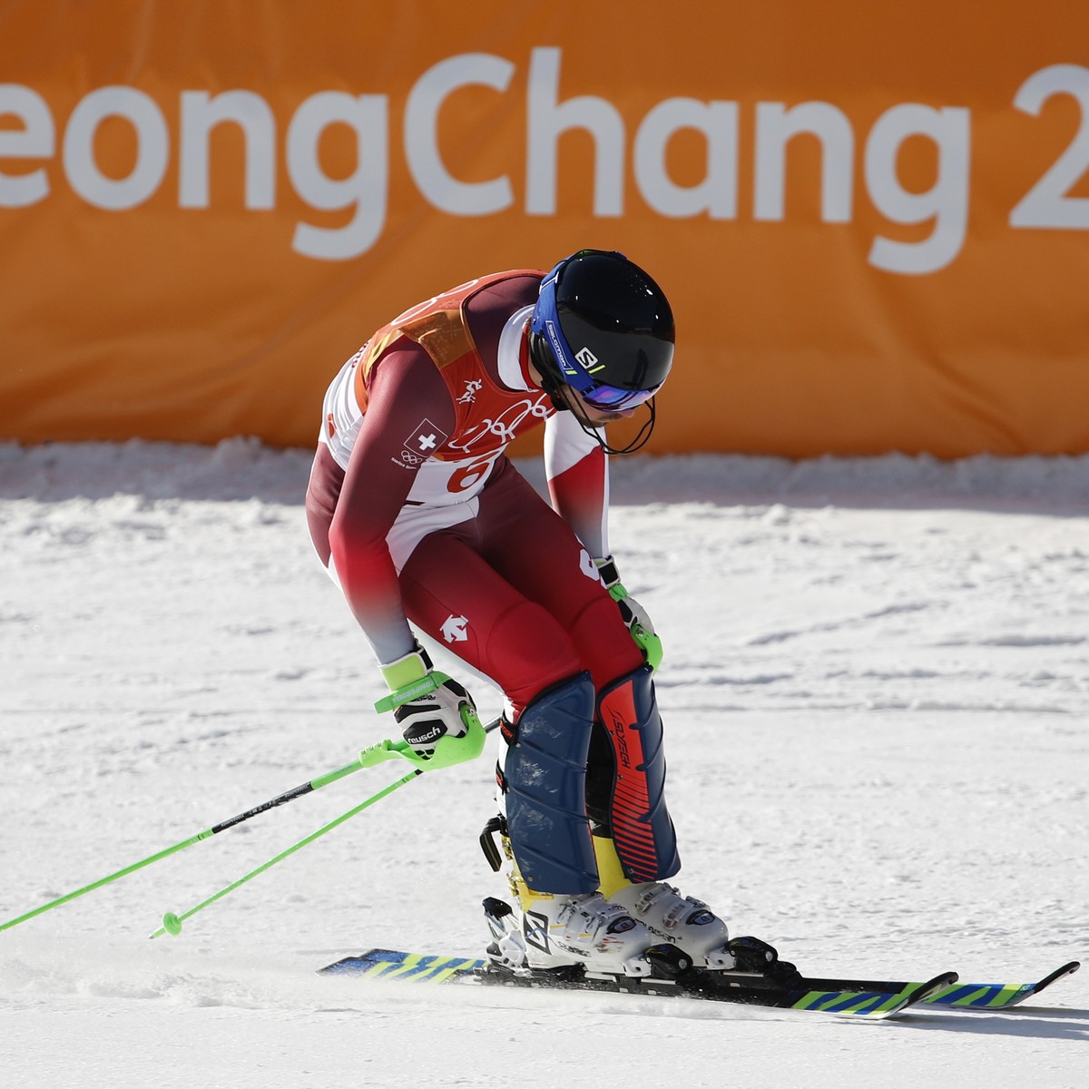 Switzerland's Luca Aerni finishes the slalom portion of the men's combined at the 2018 Winter Olympics in Jeongseon, South Korea, Tuesday, Feb. 13, 2018. (AP Photo/Christophe Ena)