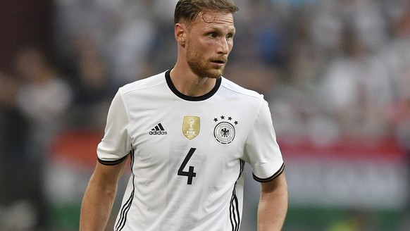 FILE - In this June 4, 2016 file photo, Germany&#039;s Benedikt Hoewedes plays the ball during the international friendly soccer match between Germany and Hungary in Gelsenkirchen, Germany. The German ...