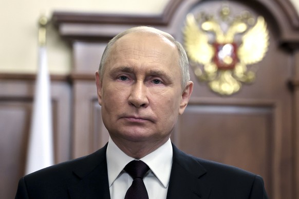 Russian President Vladimir Putin delivers a video address marking the Russia&#039;s National Flag Day at the Kremlin in Moscow, Russia, Tuesday, Aug. 22, 2023. (Mikhail Klimentyev, Sputnik, Kremlin Po ...