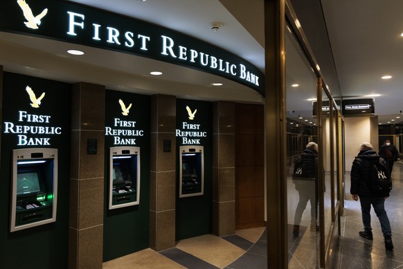 epa10595414 A First Republic Bank ATM location in New York, New York, USA, 27 April 2023. Shares in First Republic Bank have dropped sharply in the last few days following an earnings report released  ...