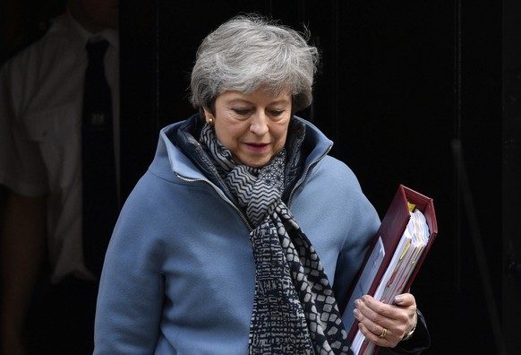 epa07482042 Britain&#039;s Prime Minster Theresa May leaves her official London residence 10 Downing Street in London, Britain, 03 April 2019. Reports state that Theresa May is expected to meet Labour ...