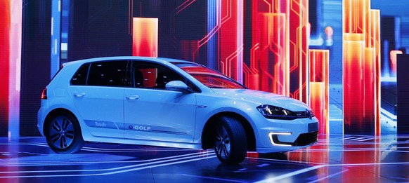 FILE - In this Jan. 5, 2016 file photo Volkswagen unveils the e-Golf Touch electric car during a keynote address at CES International in Las Vegas, United States. CEO Matthias Mueller said Thursday, J ...