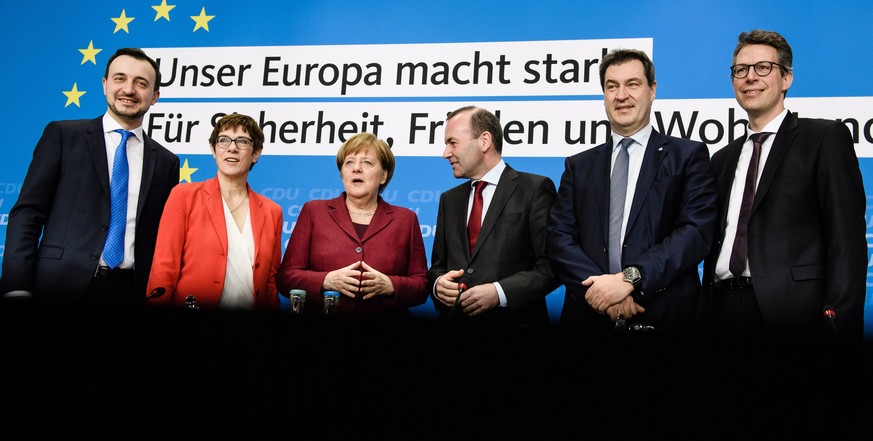 epa07462018 (L-R) Christian Democratic Union (CDU) Secretary General Paul Ziemiak, CDU party chairwoman Annegret Kramp-Karrenbauer, German Chancellor Angela Merkel, European People&#039;s Party (EPP)  ...