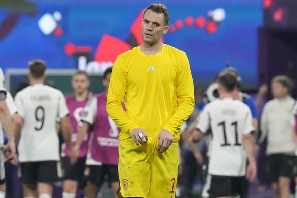 CORRECTS FINAL RESULT TO 2-1 - Germany&#039;s goalkeeper Manuel Neuer is dejected at the end of the World Cup group E soccer match between Germany and Japan, at the Khalifa International Stadium in Do ...