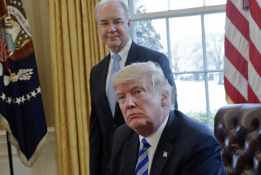 FILE - In this March 24, 2017 file photo, President Donald Trump with Health and Human Services Secretary Tom Price are seen in the Oval Office of the White House in Washington. Price resigned Sept. 2 ...