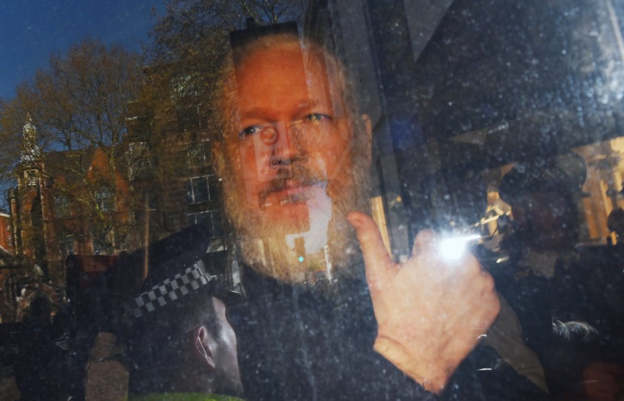 epa07498725 Wikileaks co-founder Julian Assange arrives at Westminster Magistrates Court in London, Britain, 11 April 2019. Wikileaks co-founder Julian Assange was due to appear before the Westministe ...