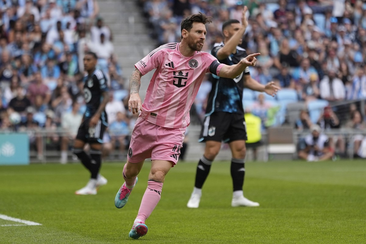 Inter Miami forward Lionel Messi (10) celebrates after scoring a goal during the second half of an MLS soccer match against Minnesota United, Saturday, May 10, 2025, in St. Paul, Minn. (AP Photo/Abbie ...