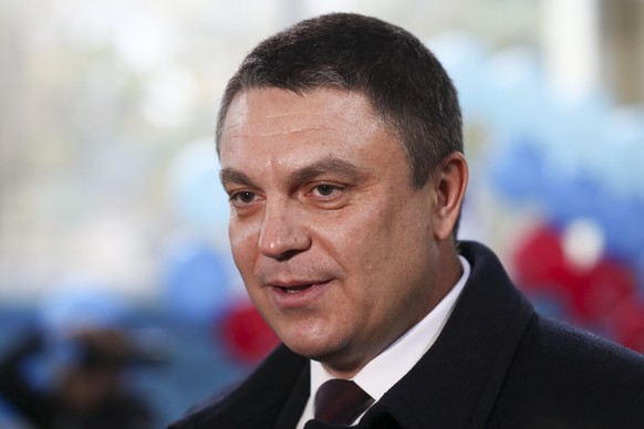 FILE - Leonid Pasechnik, leader of self-proclaimed Luhansk People&#039;s Republics speaks to the media at a polling station during rebel elections in Luhansk, Ukraine on Nov. 11, 2018. The leader of o ...
