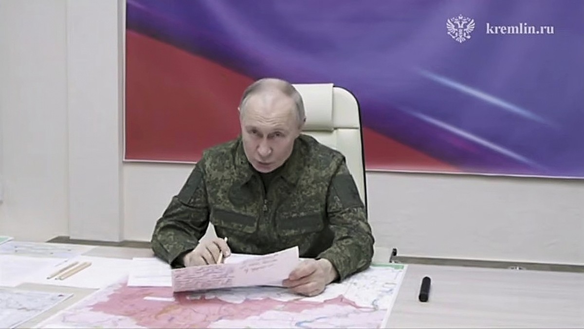 In this image made from video released by the Russian Presidential Press Service, on Wednesday, March 12, 2025, Russian President Vladimir Putin speaks during a visit to military headquarters in the K ...
