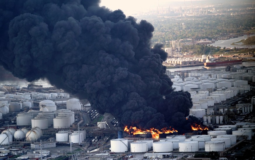 A plume of smoke rises from a petrochemical fire at the Intercontinental Terminals Company Monday, March 18, 2019, in Deer Park, Texas. The large fire at a Houston-area petrochemicals terminal will li ...